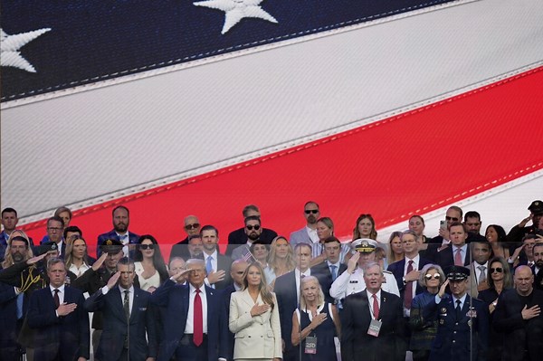 Military parade rolls through DC as 'No Kings' protesters across US decry Trump