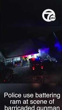 Police use battering ram at scene of barricaded gunman