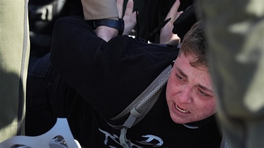 Protesters arrested, officers injured in clash outside Chicago-area immigration facility