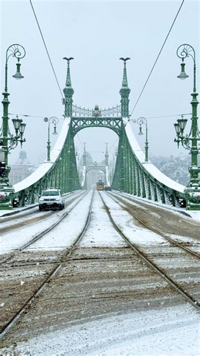 Snow Day in Budapest ❄️ After more than a decade of warm, wet winters, the city has recently transformed into a winter wonderland blanketed in snow. Follow for more cinematic moments from around the world 🌍 #Budapest #Hungary #Magyarország #BudapestinWinter #WinterinEurope