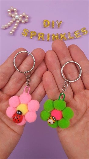 You NEED These Pom Pom Flower Keychains 😍🌸 This is your sign to make the CUTEST spring keychains EVER! 🌼🔥 Only pom poms glue = magic! 🐞🐝 Try this TODAY and thank me later 😍✨ #ViralDIY #CraftTok #DIYHack #CuteCraft #PomPomLove #fypシ #SpringVibes #HandmadeWithLove #KidsDIY #CreativeKids #ShortsDIY | DIYSprinkles - Easy Crafts