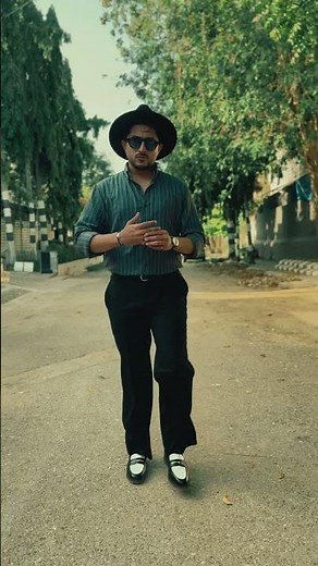 Waqar showcases the refined elegance of our Mid Blue Linen Striped Button-Down Collar Shirt craft...
