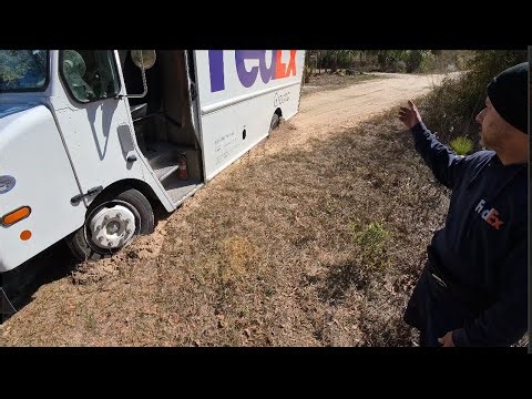 FedEx truck stuck in sand, can the Jeep Wrangler Rubicon winch it out? Jeep recovery