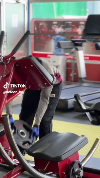 Effective Workout Routine on a Red Exercise Machine