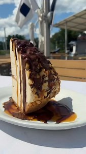 Serves 2… but we won’t tell if you don’t share. 😉 Our Macadamia Turtle Pie is topped with vanilla ice cream, rich chocolate, and caramel sauces — the ultimate #NationalSundaeDay treat. 🍫✨ | The Boathouse