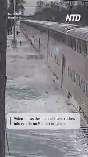 Video shows the moment a train crashed into a vehicle on Monday in Illinois. The car sat with its front-end over the tracks as a Metra BNSF commuter train could be seen approaching. | NTD News