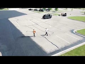 Professionally Seal Coating A Parking Lot