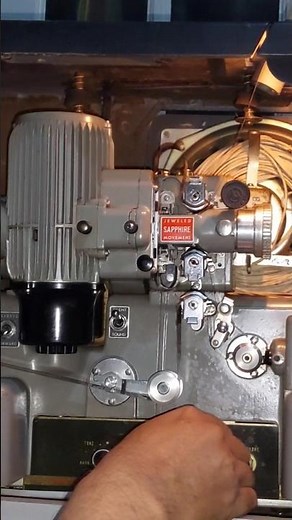 Insert the cassette into the projector (BELL & HOWELL 1940s) #shorts