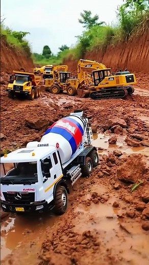 Construction Site in Full Gear: Cement Truck and Excavators at Work!
