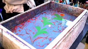 Paper marbling is a method of aqueous surface design, which can produce patterns similar to smooth marble or other stone. Ebru - The art of painting on the water.