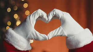 Santa making a heart sign with his hands - Free Stock Video