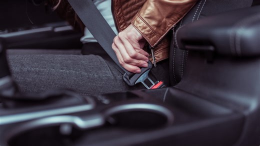 Why did car manufacturers stop using automatic seat belts?