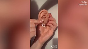 Stylist and Rapunzille founder shows how to style a triple ear lobe piercing