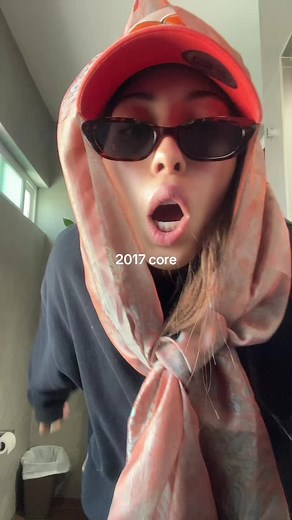 Red Cap Fashion in a Modern Bathroom Setting