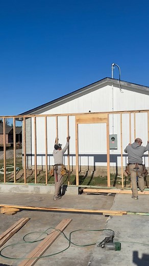 Standing the first wall on Manford house build | Jason Trotter
