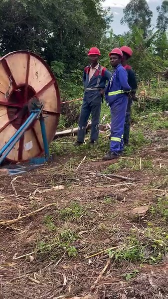 Stringing of conductor from location 88 to location 74 along 132kV Awendo - Masaba Transmission Line Project. Tensioner machine releases the conductor from the drum as it is pulled by a Puller machine at location 74. It is a section of 14 towers from 88 -74. Only five towers (88-93) left to complete stringing works. #StringingWorks #KETRACOProjects #KETRACO #ReliablePower #StablePower #NationalGrid | Kenya Electricity Transmission Company Limited