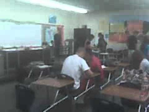 Kid flips desk during exam