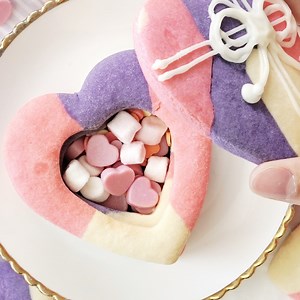 Candy-filled heart cookies make for the best love notes. 💝 | Tastemade