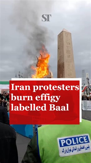 Iranian protesters burn effigy labelled Baal, depicted as satanic figure bearing Star of David, and chant Death to Israel during demonstration. | The Sudan Times