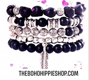 Black Beaded 5 Piece Buddha and Feather Bracelet Set $18.95 https://www.thebohohippieshop.com/collections/bracelet-sets/products/white-beaded-5-piece-bracelet-set | The Boho Hippie