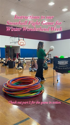 Brittany•PE TEACHER on Instagram: "❄️It’s Winter Wonderland Week ❄️ Here’s how to play “Snowball Fight” Collect snowflakes (hula hoops) by getting snowballs (balls) or presents(colored gator balls) into the chimney (kan-jams) or to the North Pole (basketball goal). Once you have enough snowflakes, build an igloo (hula hut) or a snowman (double-decker hula hut). Two reindeer (students) and two Santas can guard your igloos or snowmen. The team with the most igloos at the end wins the snowball figh