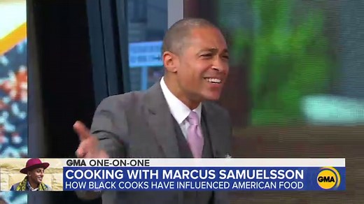 Chef Marcus Samuelsson shows T.J. Holmes how to make shrimp and grits