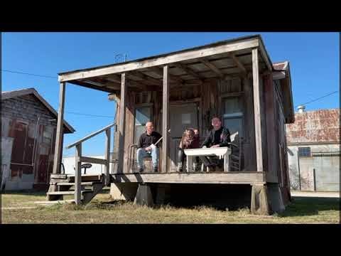 One stringed Diddley Bow on a sharecroppers shack porch