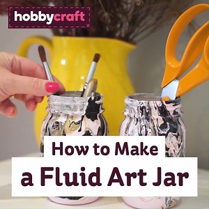If you're looking for a mason jar craft hack – look no further! Create these decorative jars in a few easy steps, great to store pens in your home office or to display fresh flowers! Shop jars: https://bit.ly/3kIcKZp #Jars #FluidArt #Hobbycraft | Hobbycraft