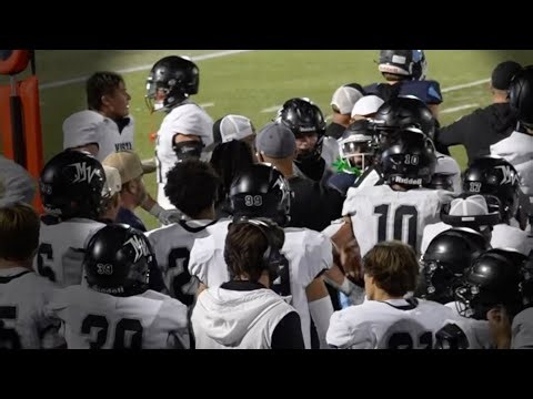 High School assistant coach suspended for contacting player's helmet during end-of-game melee