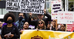 Hundreds march in downtown Seattle for worker, immigrant rights