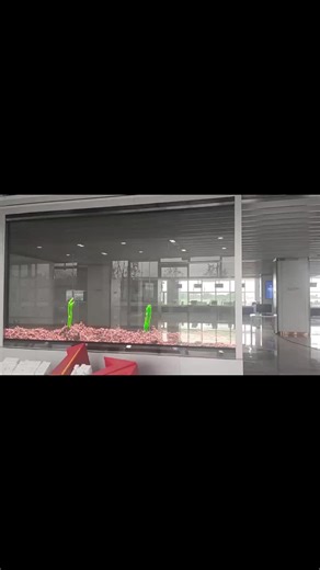 Transaprent LED screen can achieve much more effect than what you can imagine! Looks at this solution, glass wall with transparent LED displays. You can look the inside but also see a best transprent LED screen here. #ledscreen #transparentledcreen #SoStron #glasswall #glassart #digitalwall