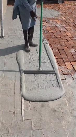 Concrete Overlay Process to Transform Old Brick into a Smooth Finish