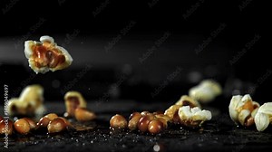 Popcorn explodes in the pan. Filmed on a high-speed camera at 1000 fps. High quality FullHD footage