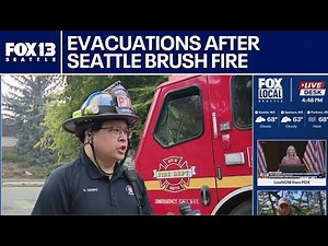 Multiple homes evacuated after brush fire on I-5 spreads to nearby neighborhood