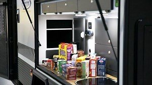 Check out how much you can fit in the Kitchen Pantry! 🍪🥐🥪🍯🍾🤩 The Reconn R4 is spec’d with so much storage! Cook up a storm in your deluxe kitchen 👩‍🍳👨‍🍳 | Lifestyle Campers