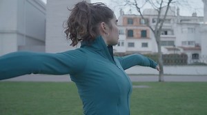 Fitness Enthusiast Starts Her Workout Routine by Warming Up - Free Stock Video Footage | Coverr