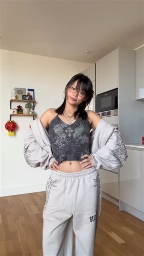 i_thriftflip on Instagram: "Thrift flip t shirt into alt rhinestone top<3 Lovely tracksuit from @namedcollective 🖤🖤🖤🪽#thriftflip #upcycle #upcycling #sewing"