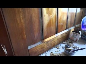 Refinishing wood panelling with Briwax