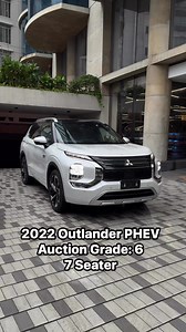 80K views · 530 reactions | Like Brand New  | 2022 Mitsubishi Outlander PHEV Premium Package✅ Auction Grade: 6 ✅ Only 6,000 km | 7-Seater | Top Grade Runs up to 110 km on just 1L fuel + full charge!Perfect blend of power, comfort, and efficiency. | Tijarah Motors Ltd. | Facebook