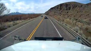 A car in front of a truck suddenly slams on the brakes, forcing the truck to rear-end it. Since trucks require longer stopping distances, this scam exploits their braking limitations. | The Truck Driver Guy