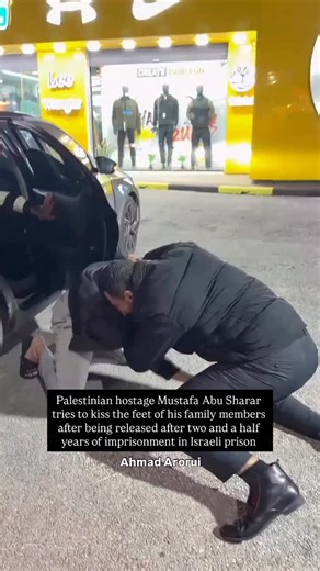 Palestinian hostage Mustafa Abu Sharar tries to kiss the feet of his family members after being released after two and a half years of imprisonment in Israeli prison. Video: @ahmad_aroure | Wear The Peace