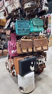 Elevate your work style with our stunning tooled leather and cowhide briefcases. Handcrafted for quality, they offer both functionality and timeless appeal. Western-linens.com | Western Linens