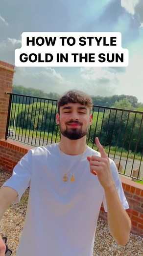 Styling Gold Men's Chain Pendants: Layered or Solo?