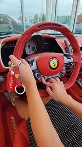 Harness the power of Ferrari every time you turn the engine with the Evo Saffiano Keychain. The 100% calfskin leather keychain features dual metal rings and a Scuderia Ferrari racing shield. | Ferrari of New England