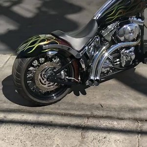2.2K views · 152 reactions | 2001 HD Deuce equipped with a @heartlandbiker 250 Wide Tire Conversion and @ridewrightwheels 60 Spoke wheels. #heartlandusa #heartlandbiker #hd #softail #deuce #fsxtd #custom #flames #rollyourown #freedommachine #liveyourlegend #rideeveryday | Heartland USA | Facebook