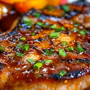 Peach Glazed Pork Chops Juicy pork chops seared and coated in a sweet, sticky peach glaze. This dish brings savory, sweet, and smoky flavors together for a quick weeknight dinner that still feels special. Ingredients 4 pork chops (bone-in or boneless) 1 tablespoon olive oil Salt and black pepper For the peach glaze 1 cup peach preserves or peach jam 2 tablespoons soy sauce 1 tablespoon apple cider vinegar 2 garlic cloves, minced 1/2 teaspoon red pepper flakes (optional) 1/2 teaspoon smoked papri