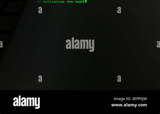 Close up of green computer code typing on a dark monitor screen. The text reads initialize the hype with a blinking cursor. Concept of artificial intelligence generating software Stock Video Footage - Alamy