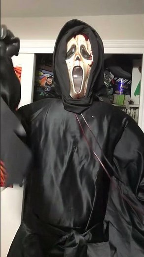 Spirit Halloween 2024 scream Ghostface animatronic with bleeding mask