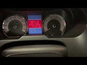 Where is the key slot located on the Jaguar XF?