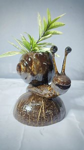 Boney | craft of coco | master ideas on Instagram: "Create an 🐌SNAIL from a Coconut Shell!🥥 #coconutshellproduct #coconutshellcraftideas #coconutshellcraft #diy #craft #love #bts Learn how to create a unique and creative coconut shell snail decoration at home with this easy DIY tutorial. Transform a simple coconut shell into a beautiful and functional decorative piece that adds a touch of coastal charm to your home decor. Get creative and upcycle your coconut shells into adorable snail decorat